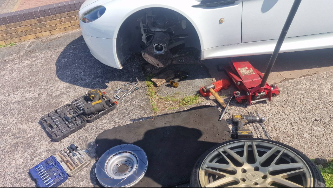 Aston Martin brake pad replacement by mobile mechanic in Newton-le-Willows